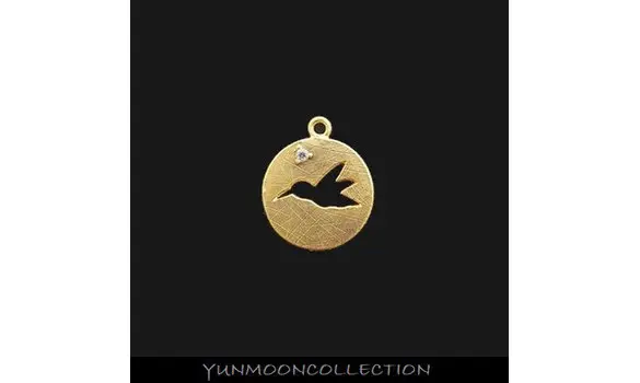 Un oiseau connecteur en mat plaqué Or